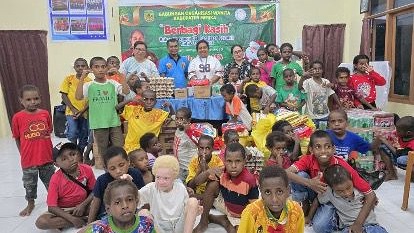 peringati-hari-ibu-gow-mimika-bagikan-bingkisan-natal