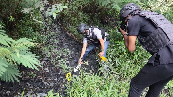 polisi-olah-tkp-penembakan-tukang-ojek-di-puncak-jaya